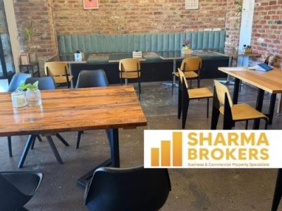 Modern-Sharma-Brokers-Real-Estate-Logo-with-Handshake-13
